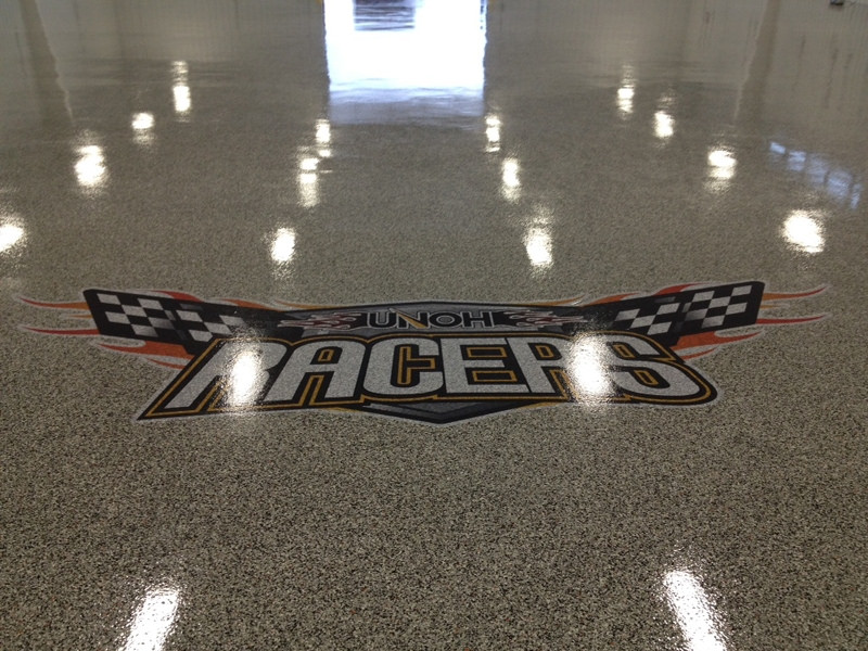 Concrete Floor Logo — Custom Automotive Emblem in Epoxy Garage Floor